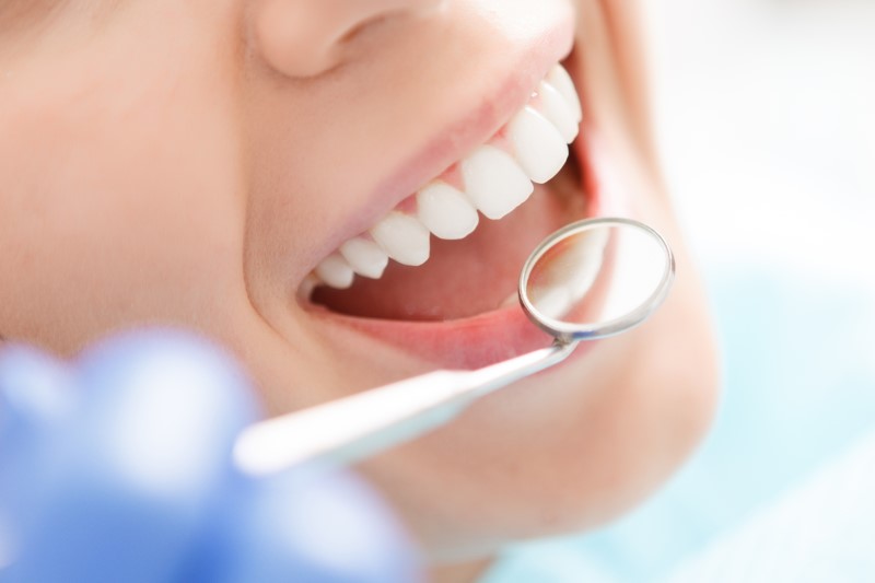 a dental patient getting an oral health check.