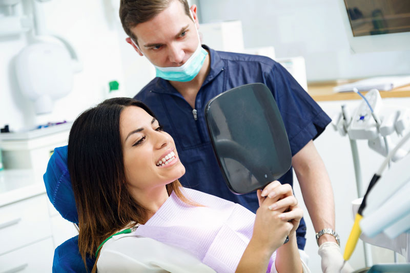 a dental implant patient undergoing a teeth replacement procedure.