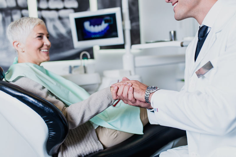 dental-implants-patient-smiling-after-procedure