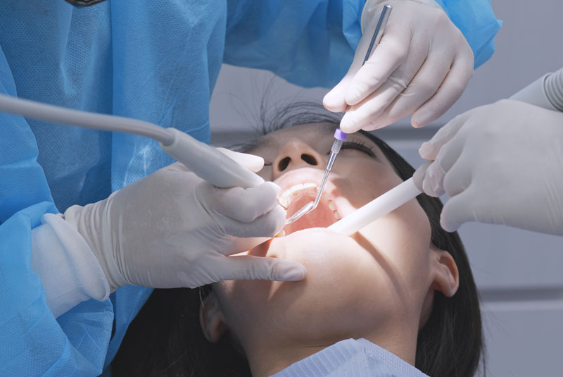 dental-patient-undergoing-scaling-and-root-planing-procedure