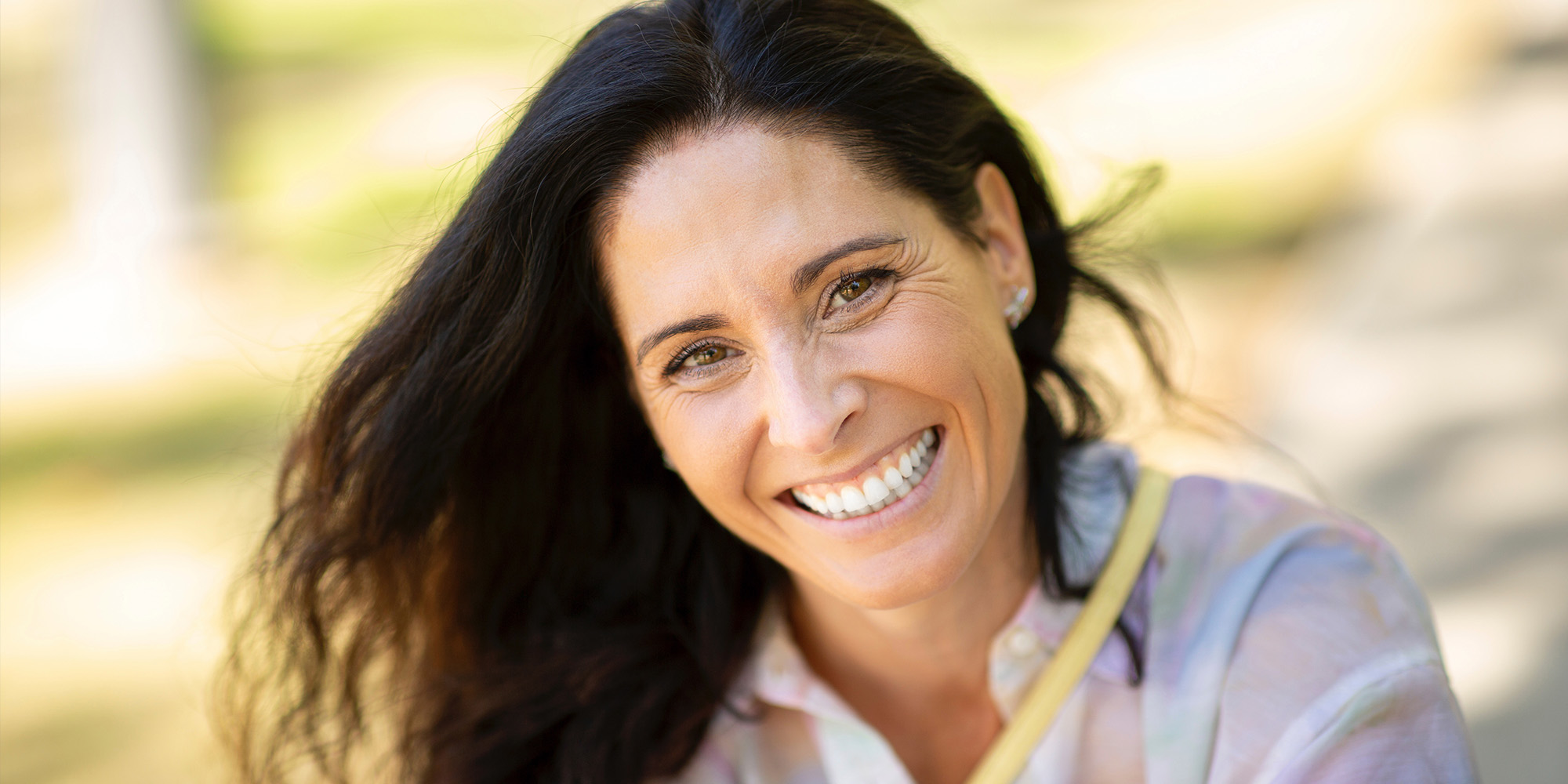 dental patient smiling after dental implant treatment